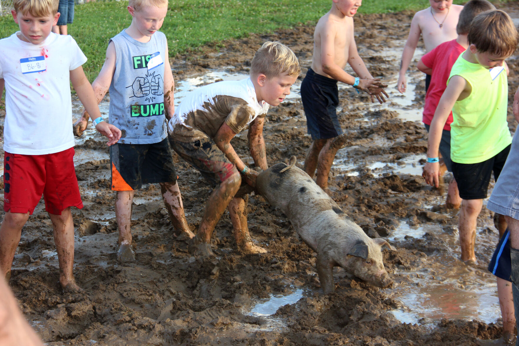 Max Berry grabs a pig